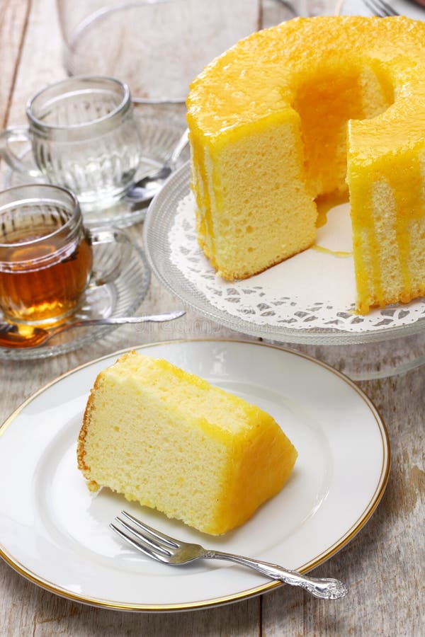 Homemade orange chiffon cake, close up. Homemade orange chiffon cake, close up